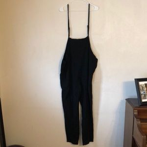 Black cotton overalls.